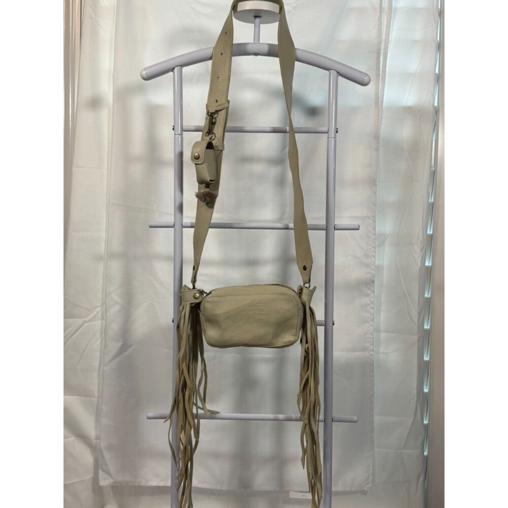 Nena & Co Cream Leather Crossbody • Removable Fringe Cuffs + Lipstick Holder